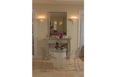 Lucite table with Louis ghost chairs