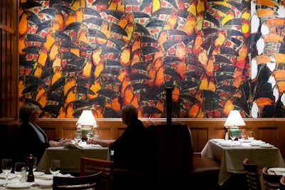 One of the Hamilton’s ground-floor dining area is nicknamed the Arboretum room, a nod to paintings of tropical birds throughout the wood-paneled space.