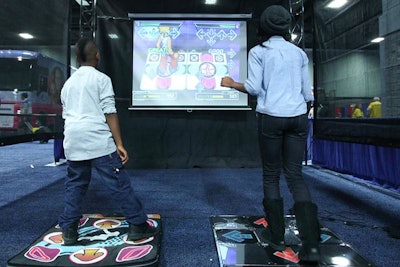 The Dance Dance Revolution exhibit proved to be a favorite for teens and tweens.