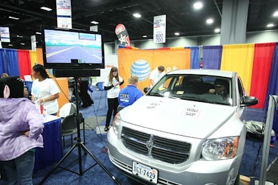 AT&T's texting and driving simulation scored participants' efforts as they tried to steer while texting on their own phones.