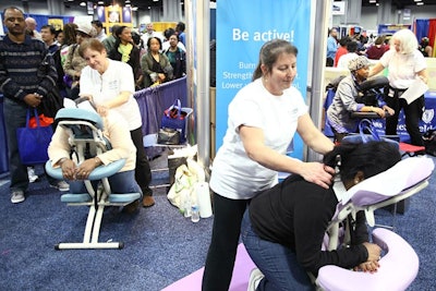CareFirst BlueCross BlueShield's exhibit included massage therapists giving out mini-massages.