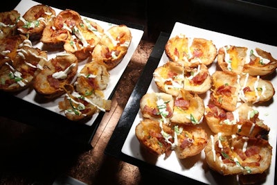 The two buffet stations in the reception space also held halved potato skins with cheese and bacon.