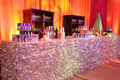 A silver confetti-covered bar served as the focal point of the V.I.P. area.