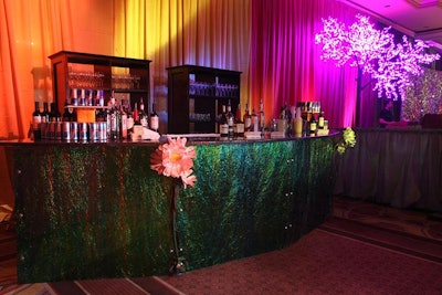 Over-size colorful flowers decorated the bars in the ballroom.