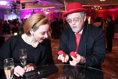 A roaming magician entertained guests.
