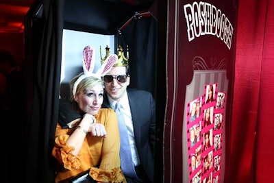 PoshBooth provided a photo booth complete with Alice in Wonderland-themed props like bunny ears, a crown, and a top hat in the V.I.P. section of the ballroom.
