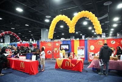 At the McDonald's booth, attendees could sign up for a Ronald McDonald House Red Shoe 5K event or spin a wheel and guess the calorie count of McDonald's menu items for prizes.