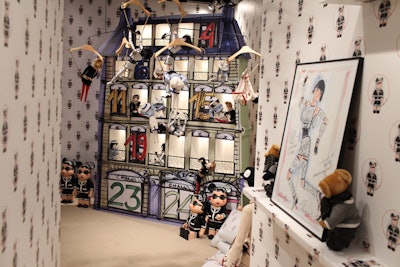 After walking through the promenade, guests entered the first room, a spacious children's bedroom filled with dolls designed by Karl Lagerfeld as well as the other projects, works, and sketches from the designer.