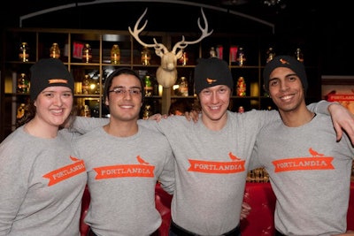 Staff members wore shirts and caps with the show's logo in its signature orange.