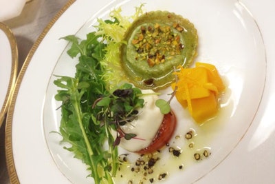 The appetizer will be pistachio-crusted pistou ravioli with wild arugula, smoked tomato, kabocha compote, and burrata.