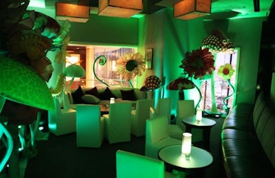 Flowers, butterflies, and speckled mushroom tops gave a whimsical look to the usually sleek lounge.