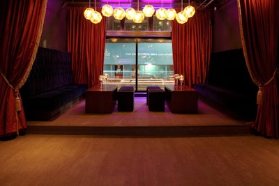 The stage can function as a V.I.P. area or as an additional private dining space.