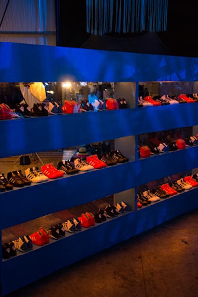To showcase the connection between the brand and the basketball player, Night Vision Entertainment constructed a case to display 54 pairs of Dwight Howard Adidas shoes. Lights embedded in the top shone down through the transparent shelves.