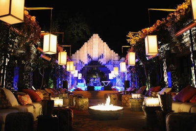 The in-ground pool and Jacuzzi in the center courtyard was covered, forming an al fresco area for guests to mingle. Multiple entry points allowed for ease of flow, while custom light boxes illuminated and heat lamps and cashmere blankets provided additional warmth.