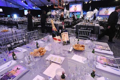 Bottles of Jameson, champagne, and Fiji water topped tables, where Along Came Mary served lunch.