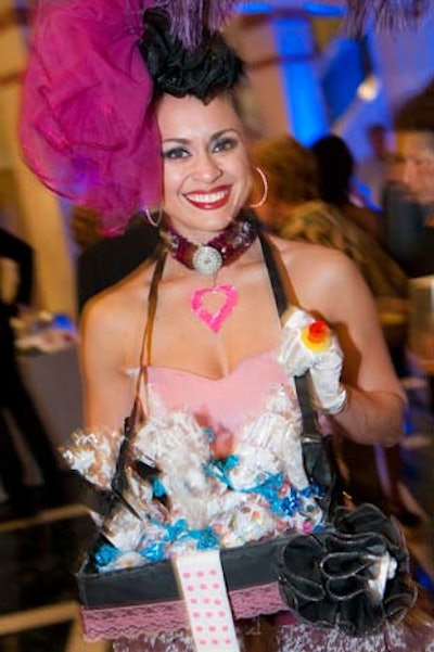 A candy girl passed out candy to guests at the reception.