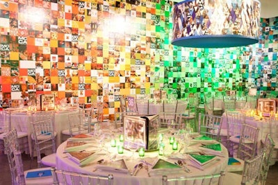 A color-coded grid comprised of 20,000 squares of the museum's past press releases, editorial clippings, photos, and invites decorated the walls. The design also covered lamp shades suspended from the ceiling.