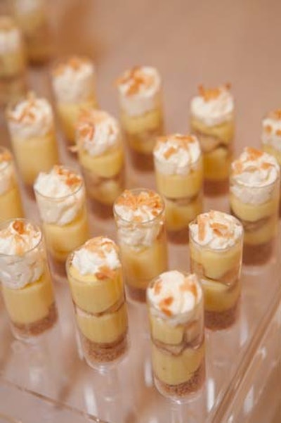 A tray with a 'Push-Up Pie Shop' theme had tubes filled with the ingredients of banana cream, sweet potato, and coconut cream pies.