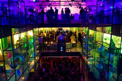 Each floor of Avenue Road was lit in colourful LED lights. Westbury National Show Systems mounted projectors for Barr Gilmore's video projections, which played for the duration of the event and covered a three-storey glass wall. To match the theme, the bottom floor, where most of the after-party took place, was lit in fiery reds and oranges, the second floor in earthy greens and yellows, and the top floor, where guests dined, in cool blues and purples.