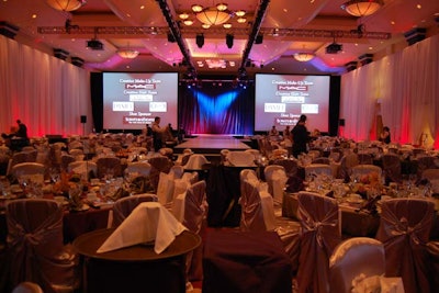 Bissada draped the walls of the Canadian Room in white and employed uplighting to change colours from red to blue. The runway ran down the centre of the space and was bordered by two large screens.