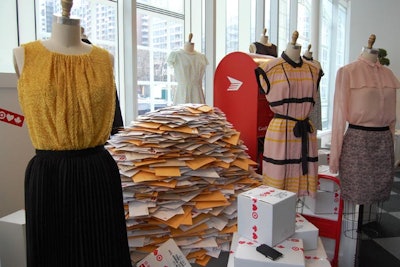 To evoke a trip to Paris, piles of letters and packages surrounded pieces from the collection.