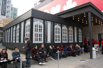 David Stark transformed the modern building with decals on the facade. Classical columns and framed windows added to the Parisian vibe. The Target bullseye filled any blank space.