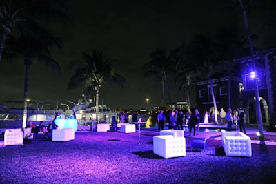 Staffers placed white club chairs and sofas around the event for guests.