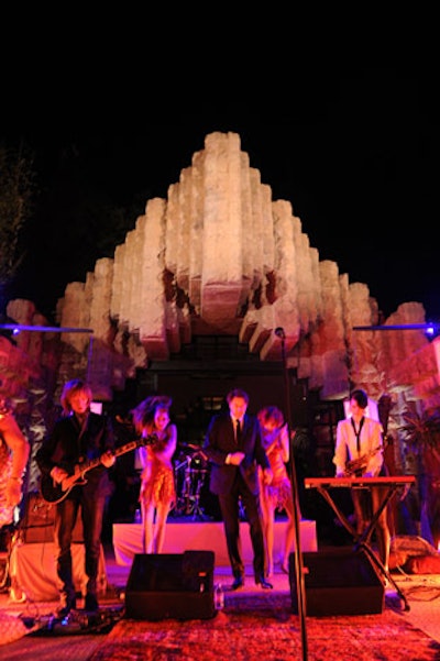 The home's architectural elements, including sand-colored concrete blocks emblazoned with images in homage to Yucatec Mayan temples, made for a striking backdrop against which Bryan Ferry performed.