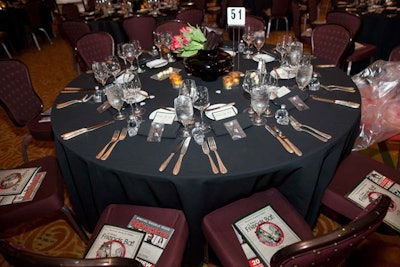 Dinner tables were covered in simple black linens.