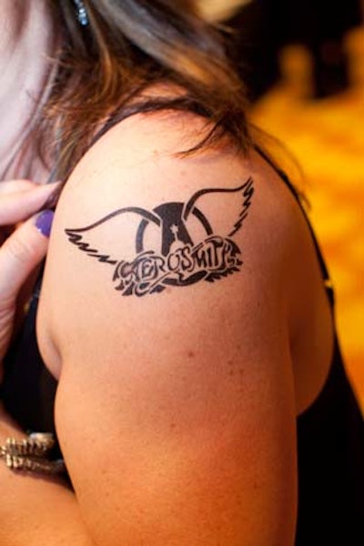 Gin C. Productions gave guests temporary tattoos, including one with Aerosmith's logo.