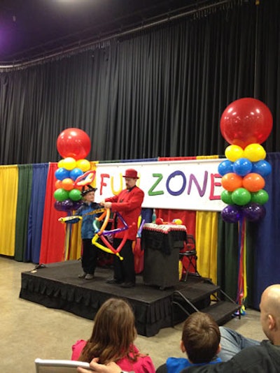 In the 'Fun Zone,' kid-friendly entertainment included balloon twisters.