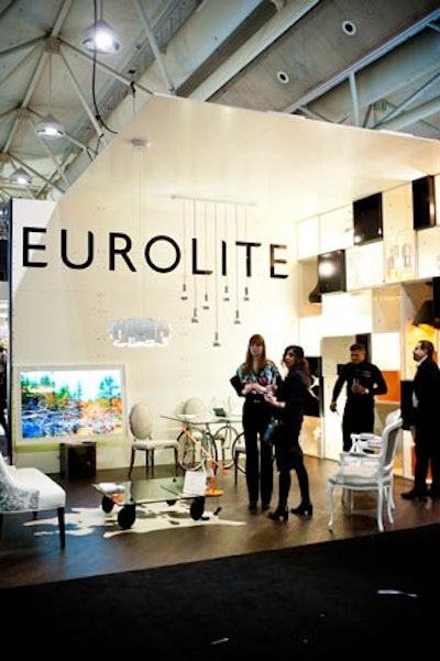 The Eurolite booth featured lighting displays within a wall of shelves.