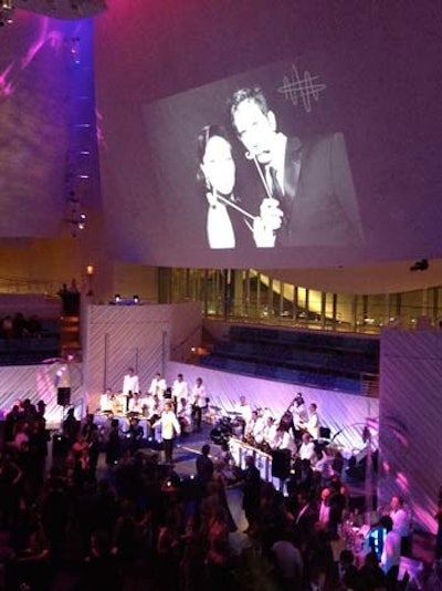 During the cocktail reception, photos from the digital photo booth were displayed onto the giant sails inside the concert hall.
