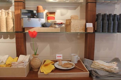 Tabletop decor items include a SmartPly stacked vase, denim-covered glass bottles, and striped denim placemats.