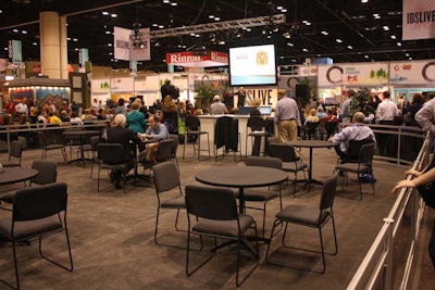 In a back corner of the I.B.S. Live area, seven tables provided a place for attendees to conduct meetings.