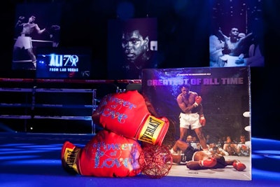 The event's logo decked boxing gloves in the ring.