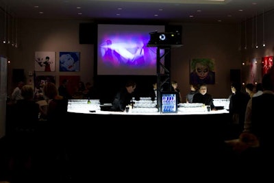 In the Sky Room at the Carlu, which included a digital art installation and an illuminated bar, attendees could buy local art items.