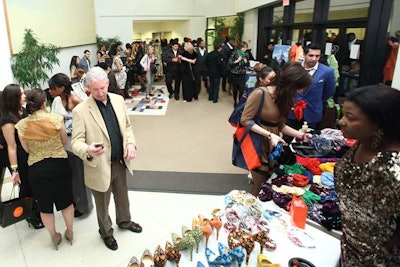 Before the final runway show on Sunday, guests could peruse accessories and jewelry at the vendor bazaar near the Embassy of France's entrance.