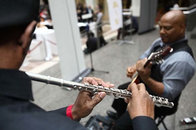 Musicians played on the Ronald Reagan Building's atrium stairs near the Spain Pavilion during the Grand Tasting.