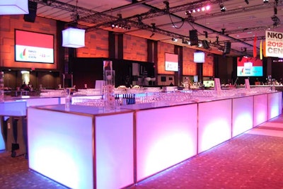 Drinks were served from two illuminated bars. Glowing cubes hung from the ceiling.