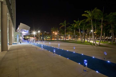 Guests walked down a softly lit blue carpet to enter the venue and cocktail reception. Blue is the symphony's signature color.