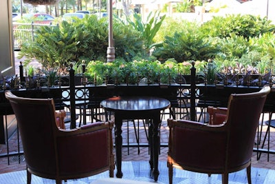 Patio seating is available on both sides of the main entrance.