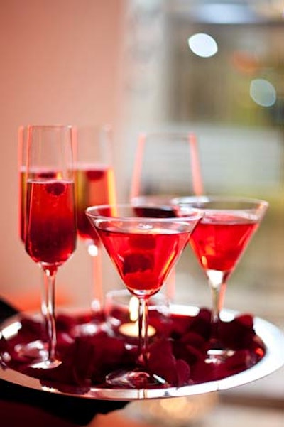 The Ritz-Carlton served red cocktails from a tray covered in rose petals. They served a Kir Royale, with champagne and a splash of creme de casis. In martini glasses they served a mocktail with grenadine, lime soda, and cranberry juice.