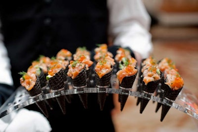 Squid ink cones held salmon tartar and caviar.
