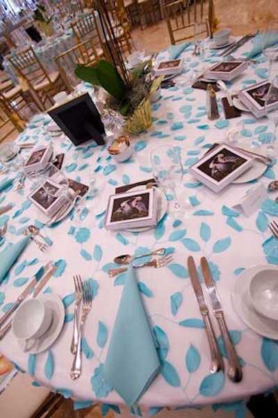 Atlas Party Rental provided white and pastel blue linens, and John Rinker donated notecards for the tables.