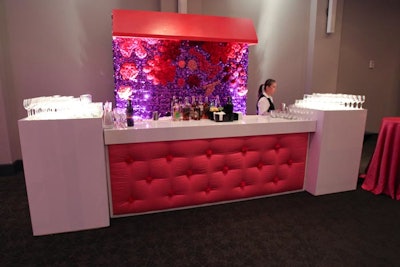 Chicka Chicka Boom Boom's hot pink bar accented by a floral wall with live flowers by H. Bloom were inspired by the book jacket and Doonan's signature floral shirts.