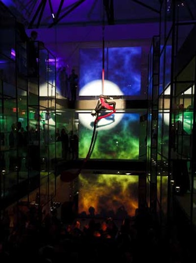 With Gilmore's video projections as a backdrop, aerialists from Zero Gravity performed in the open atrium space.