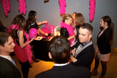 At the event, volunteers sold pink boas, which guests donned to show solidarity for the cause.