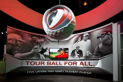 A large replica of a Penta TP golf ball hung from the ceiling to showcase the ball's five layers