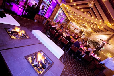 Twinkling lights, fire pits add warmth to a brisk evening.